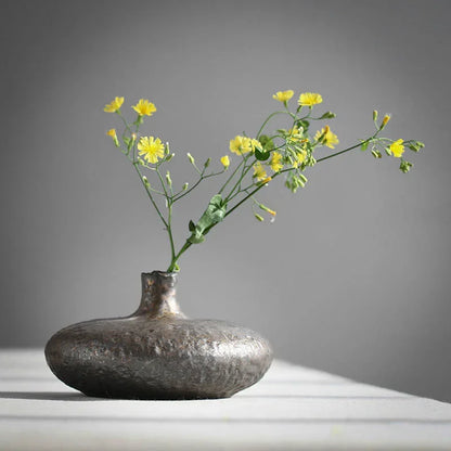 Style B small artisan pottery vase with rustic kiln texture on wooden tray