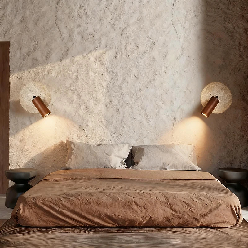 stone wall sconce, detail view of fixture base and arm