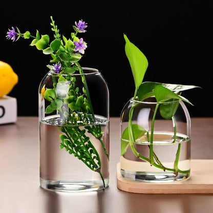 Close-up of clear glass minimalist vase with elongated cylindrical form