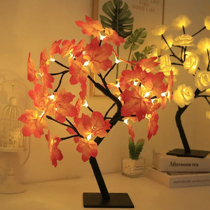 Rose blue LED flower tree lamp glowing soft blue light in bedroom setting