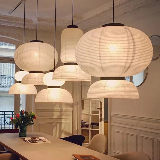 Wabi sabi rice paper chandelier with a rounded shade on polished chrome
