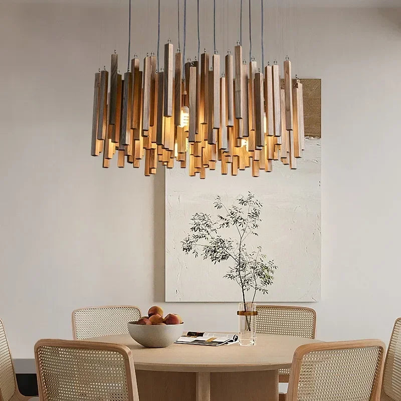 Dark wood farmhouse chandelier with plated gold iron hardware