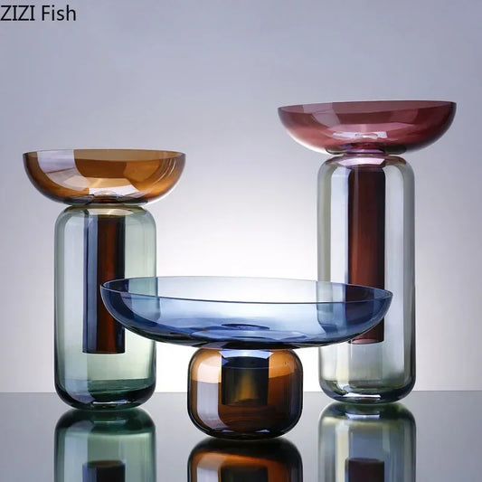 Gradient blue glass flower vase with floral arrangement