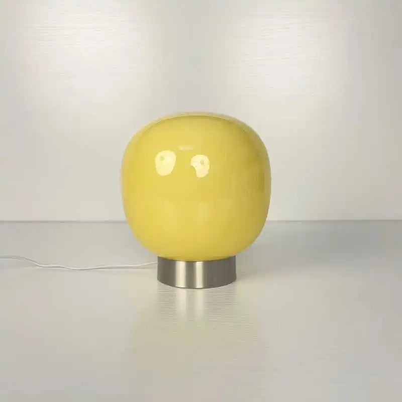 Mochi Glow cream LED table lamp soft rounded form on bedroom nightstand