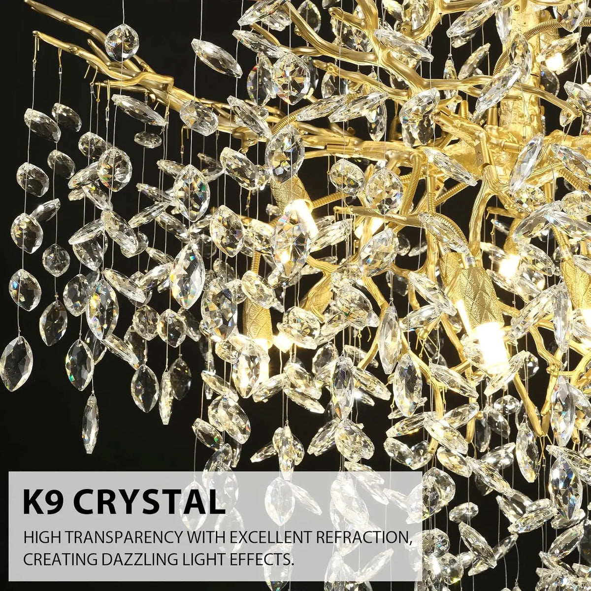 Gold crystal branch chandelier lit in warm white with up and down glow