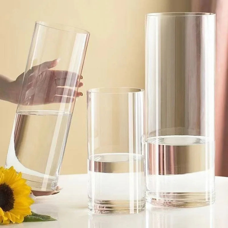 Close-up of transparent acrylic cylinder vase showing clean clear finish