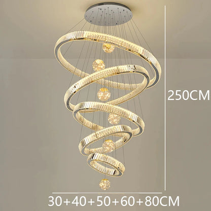 Three ring crystal chandelier in gold on adjustable cord pendants