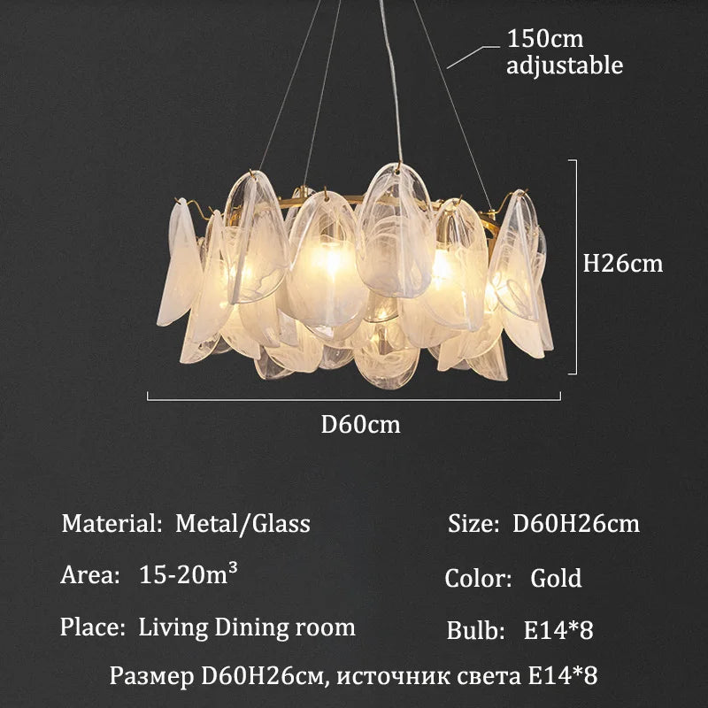 Clear glass shade detail on a gold finished flush mount chandelier