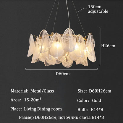 Clear glass shade detail on a gold finished flush mount chandelier