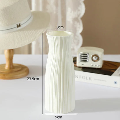 Collection of Nordic plastic flower vases showing all available style variants