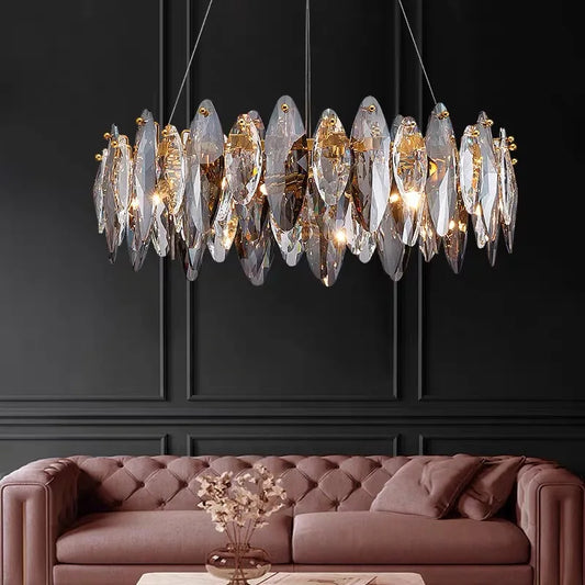 Clear crystal modern chandelier on a plated aluminum ceiling frame