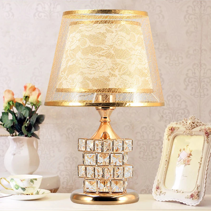 Gold crystal lamp diamond facets close-up reflecting warm light