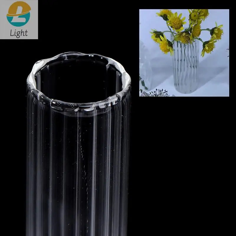 Close-up of tiny hand-crafted miniature glass vase for dollhouse decor