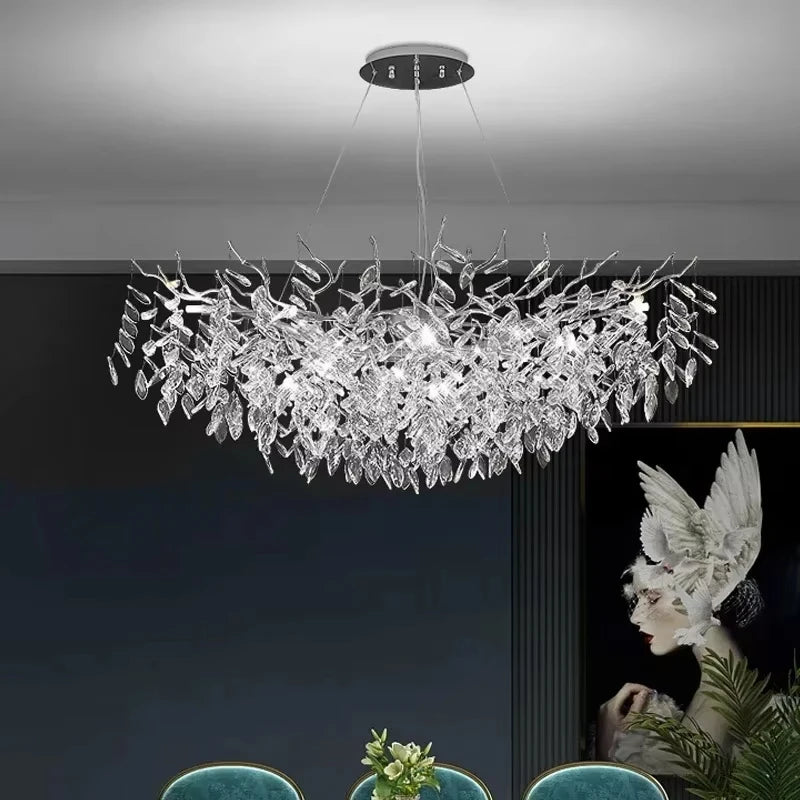Plated silver chandelier body densely hung with clear crystal drops