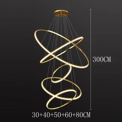 Eight ring chandelier with a long staggered gold aluminum drop