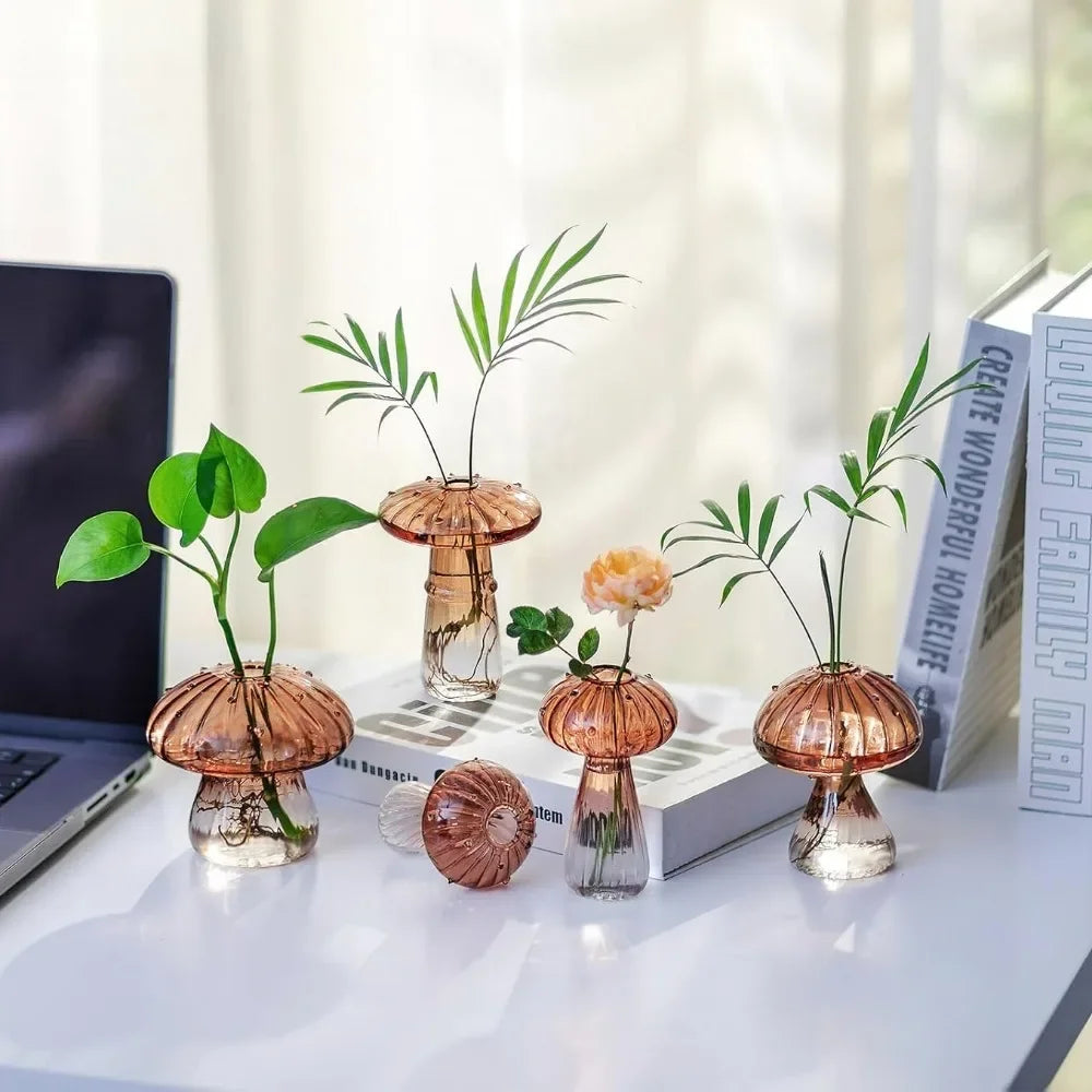 Gradient coffee mushroom glass vase displayed on wooden shelf with botanicals
