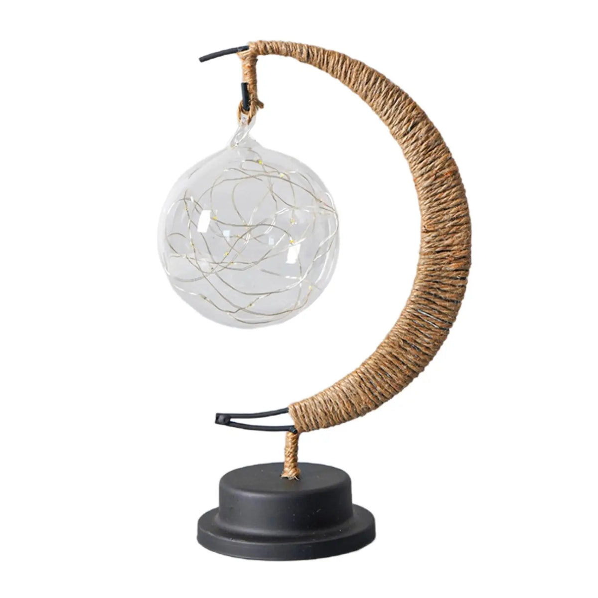 Glass star fairy light glowing softly on children's bedroom desk