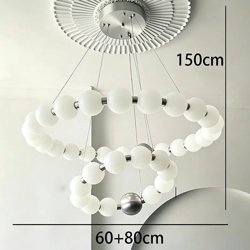 Two ring chandelier, 23.6 and 31.5 in across, in a black finish