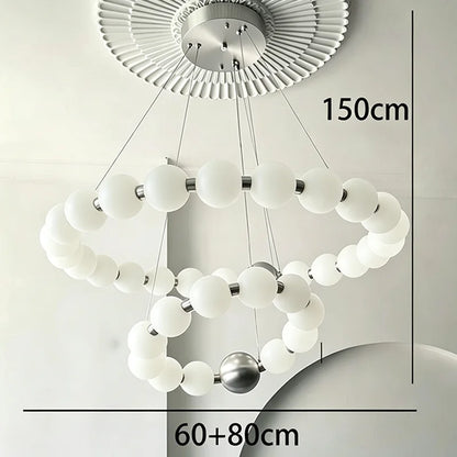 Two ring chandelier, 23.6 and 31.5 in across, in a black finish