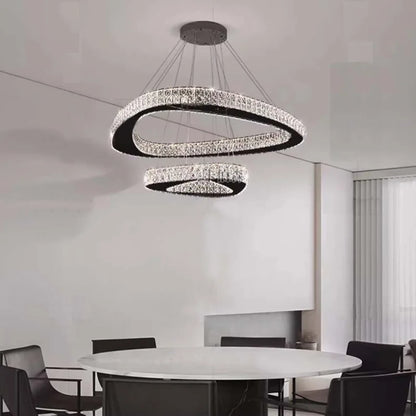 Three ring crystal chandelier, 27.6 in across, in silver steel
