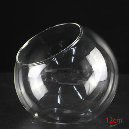 Overhead view of eco slanted glass vase showing round form and opening