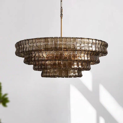 Clear glass chandelier at 35.4 in across on a gold stainless frame