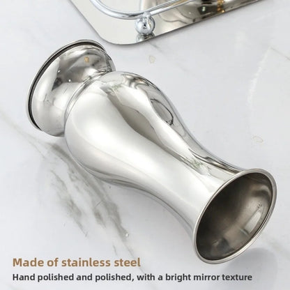Close-up of polished gold stainless steel vase neck and smooth opening