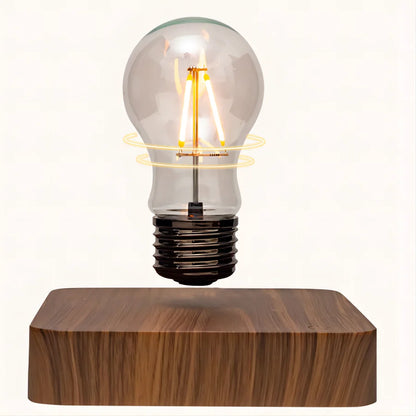 Levitating LED glass bulb close-up showing spinning motion mid-air