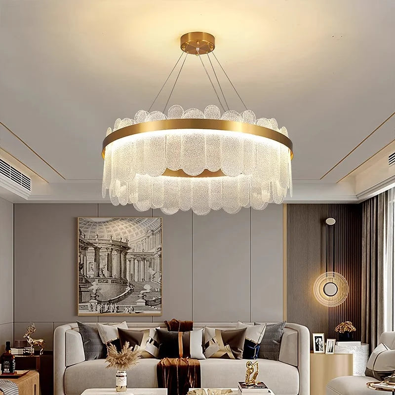 Round gold chandelier at 15.7 in across, flush mounted to the ceiling