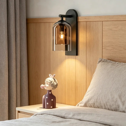 glass bathroom wall sconce, installed in a room interior setting
