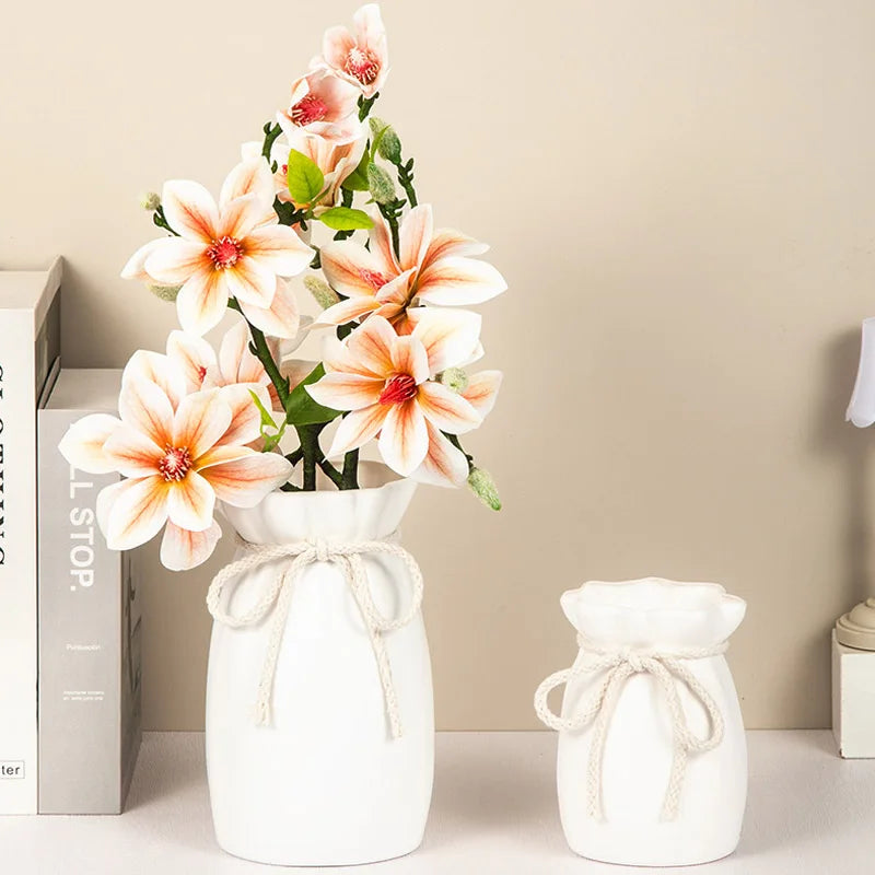 Bow design vase three sizes small medium large displayed