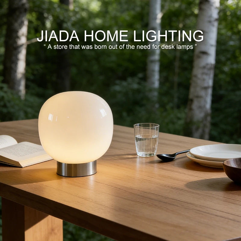 Mochi lamp cream variant overhead view showing soft rounded silhouette