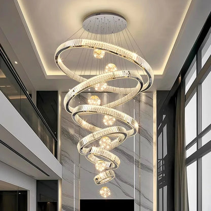 Gilded ring crystal chandelier with crystal wrapped rings hung on cords