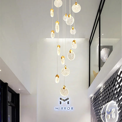 Crystal heads directing light both up and down from a ceiling plate