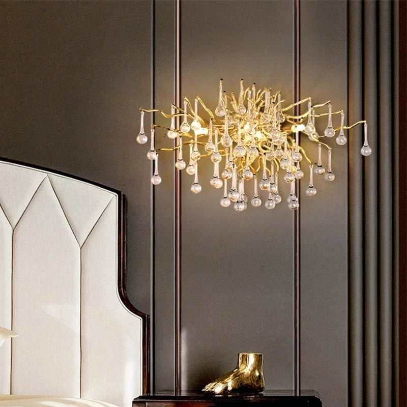 Gold crystal chandelier with cascading glass strands and G9 LED bulbs included