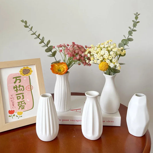 Nordic retro white ceramic flower bottle on wooden shelf