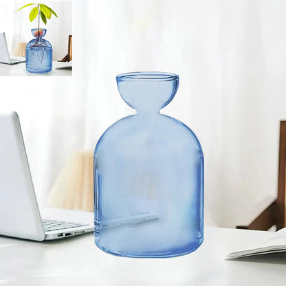 Avocado seed vase style A5 cylindrical shape with removable cradle on wooden desk