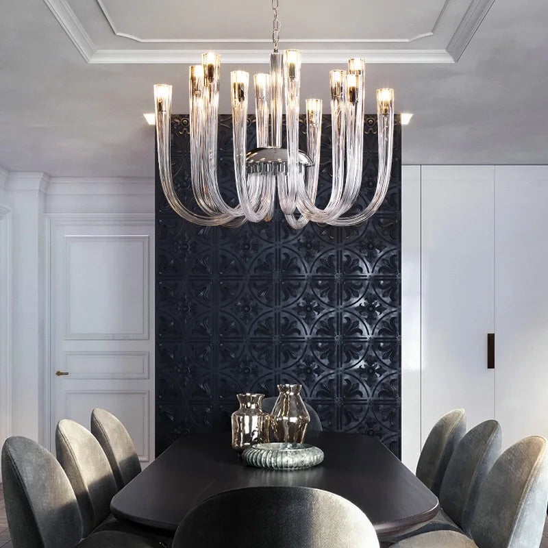Glass chandelier at 31.5 in diameter with sixteen glass heads