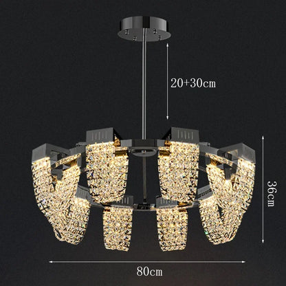 Crystal chandelier lit in cold white with a black ironware body
