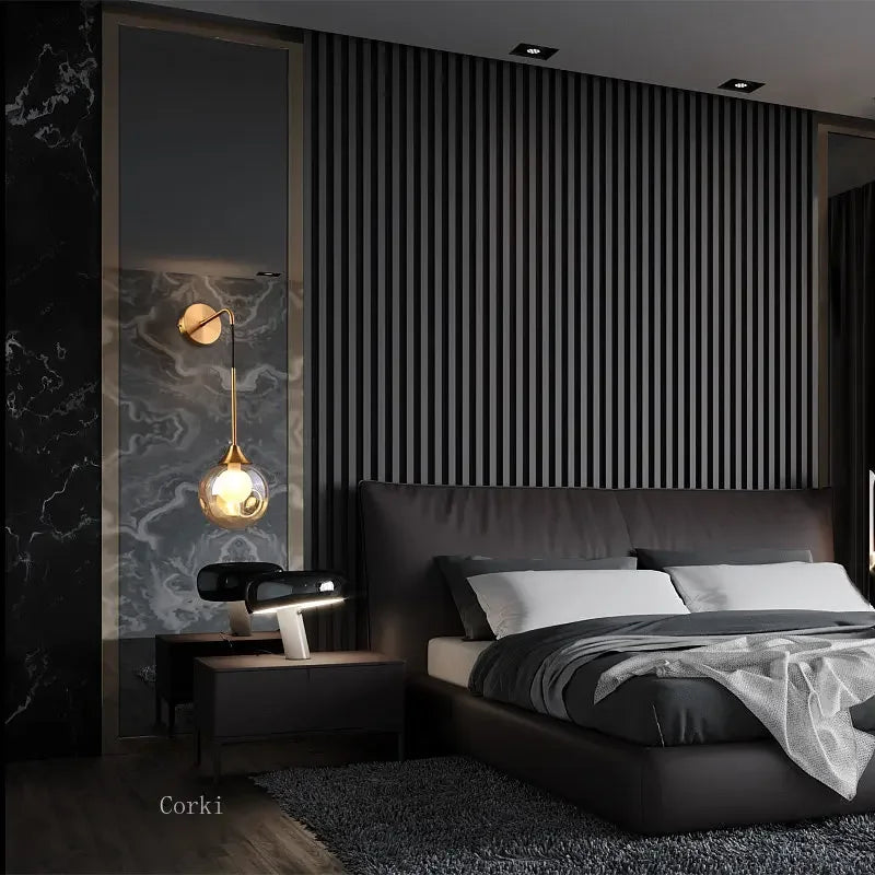 gold glass wall sconce, installed in a room interior setting