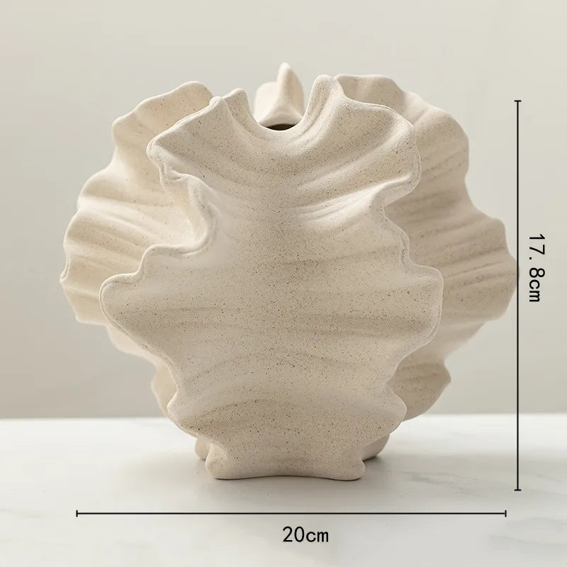 Geometric ceramic vase with dried floral arrangement display