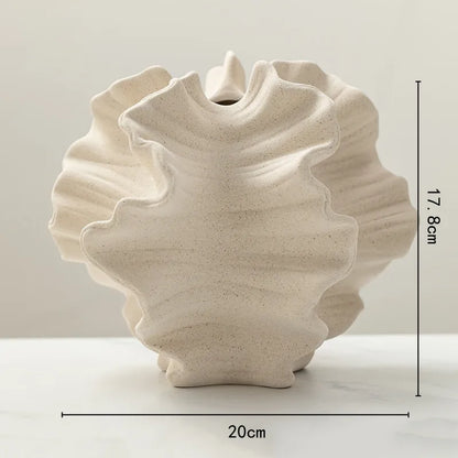 Geometric ceramic vase with dried floral arrangement display