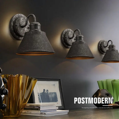iron outdoor wall sconce, installed in a room interior setting