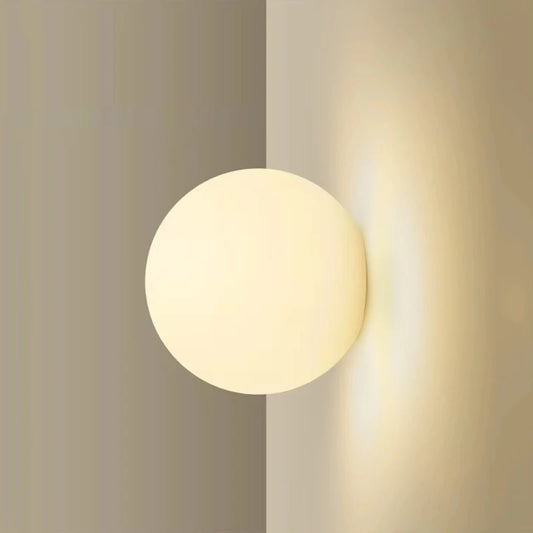 glass bathroom wall sconce, front view on white background