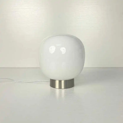 Mochi white lamp soft ambient glow in minimalist Japandi bedroom