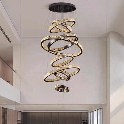 Tiered crystal stair chandelier with six rings on an ironwork frame