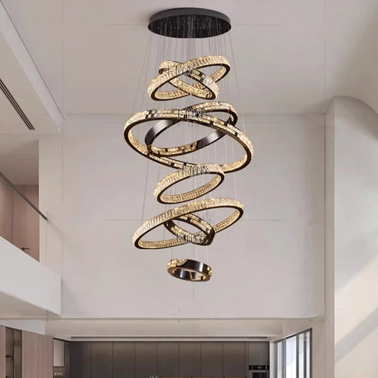 Tiered crystal stair chandelier with six rings on an ironwork frame