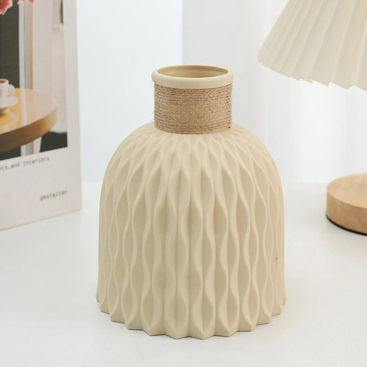 Set of beige and white Nordic wave ripple plastic vases displayed on shelf