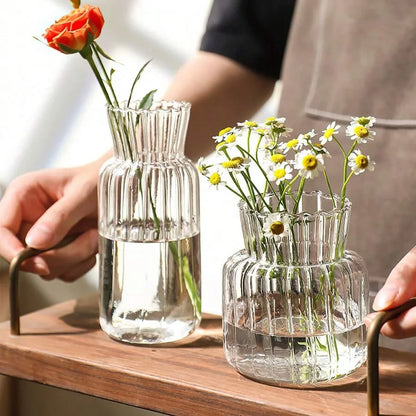 Set of four size-L retro striped mini glass vases grouped on shelf