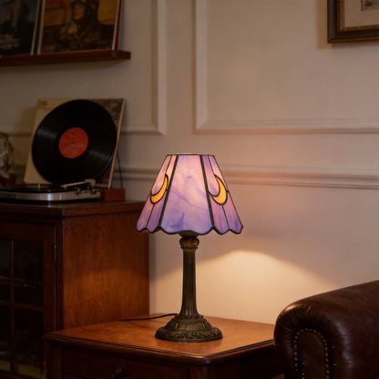 Purple stained glass lamp shade close-up showing hand-assembled panels